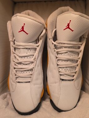 Jordan White Leather Sneakers with Red Jumpman and Yellow Accents